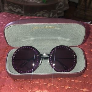 Round purple glasses with rhinestones